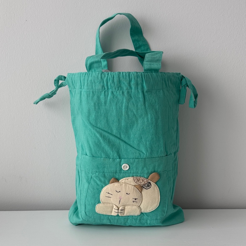 Green drawstring mini bag/pouch